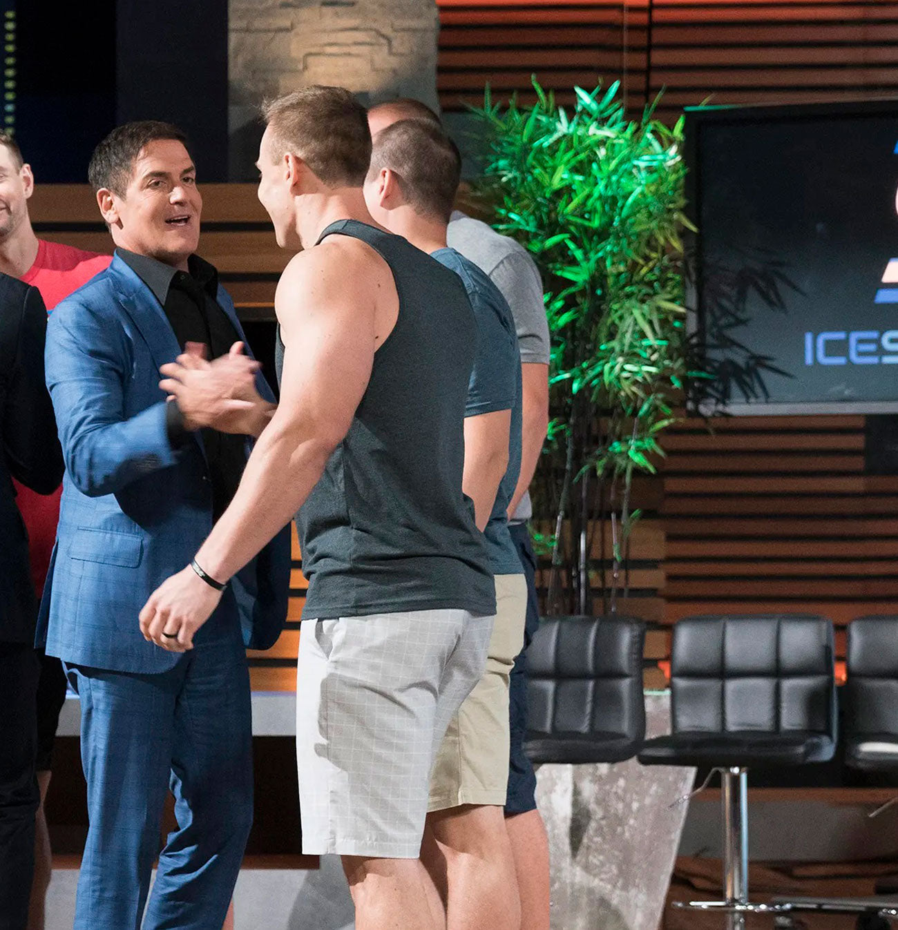 A banner containing an image of Ice Shaker CEO, Chris Gronkowski & brothers shaking hands with Mark Cuban and Alex Rodriguez on the set of ABC's Shark Tank.