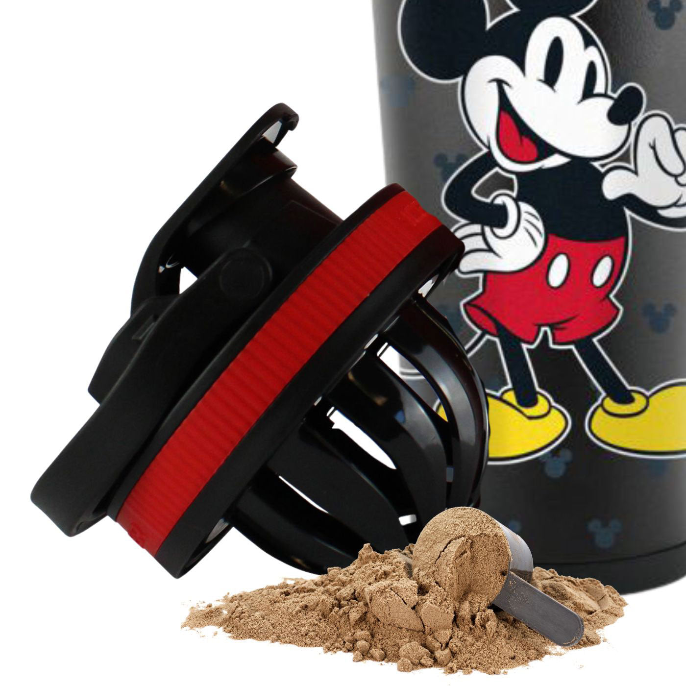 a picture of the Mickey Mouse Ice Shaker lid with the agitator twisted onto the bottom of the lid. In front of the lid is a pile of protein powder
