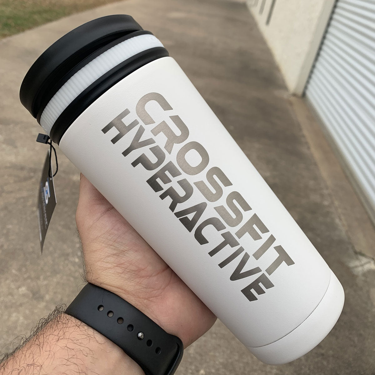 A White 26oz Ice Shaker with Crossfit Hyperactive Logo engraved on it.
