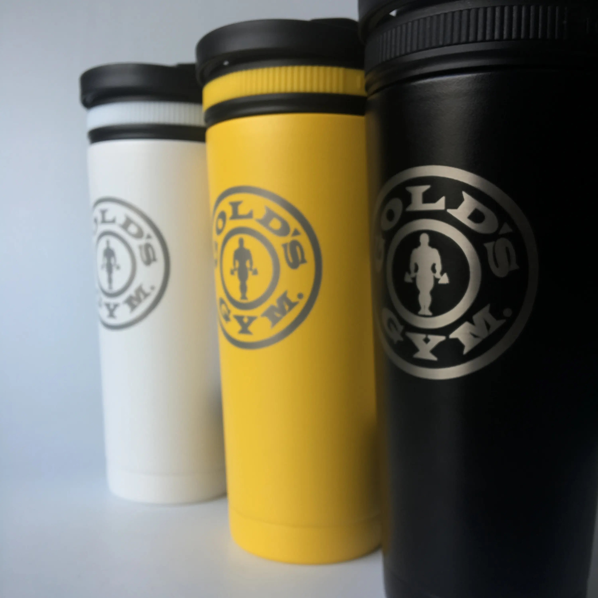 An image of 26oz Ice Shakers with the Gold's Gym logo engraved on them.