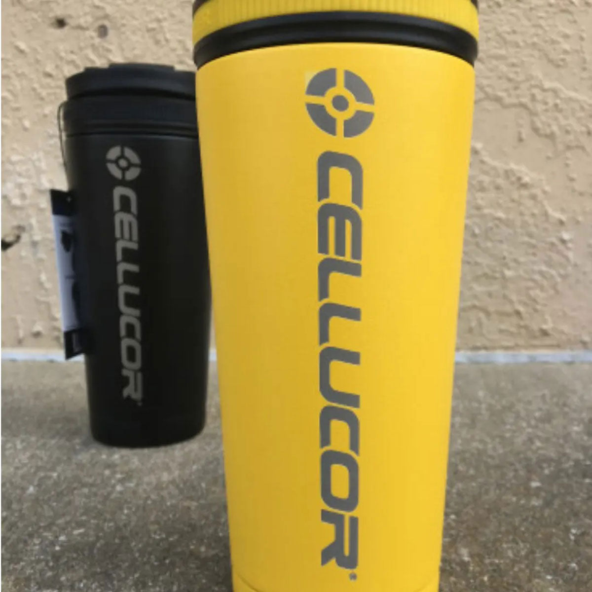 An image of a Yellow and Black 26oz Ice Shaker that's been engraved with the business, Cellucor custom logo. If you own a business and need your business logo added to our bottles, click now for custom logo orders.