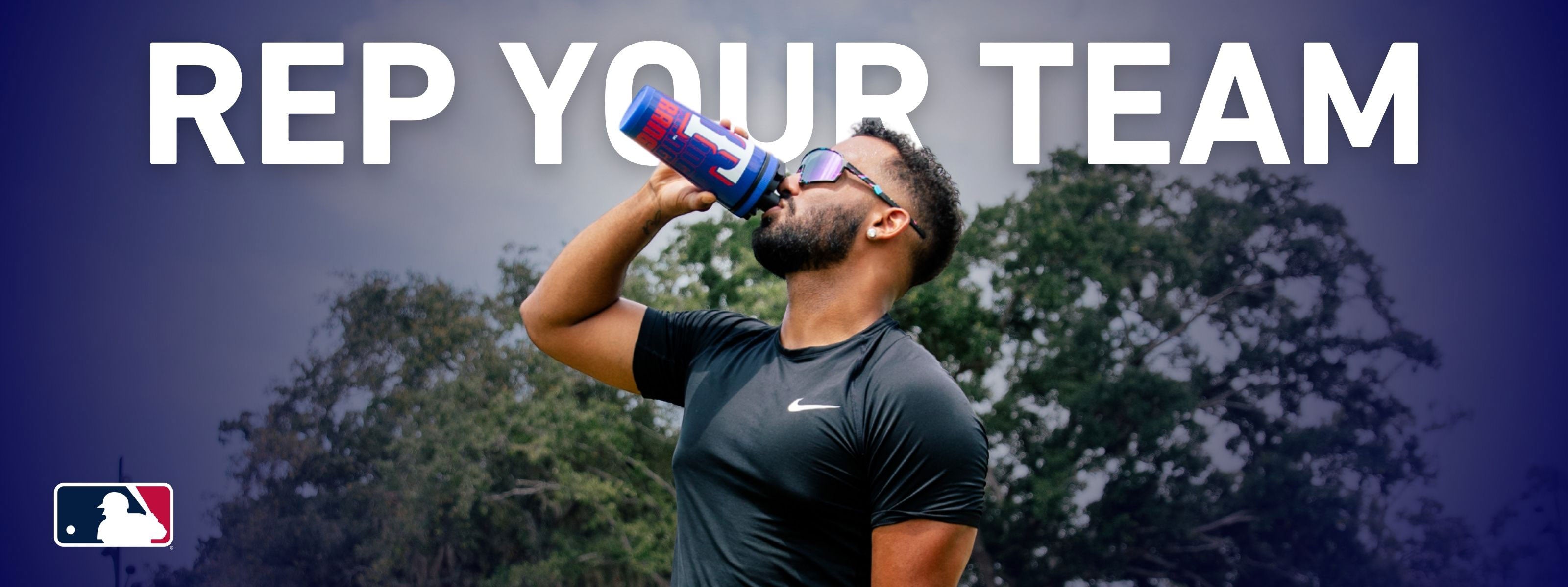 Man drinking from a Texas Rangers 4D Ice Shaker bottle with 'Rep Your Team' text and MLB logo.