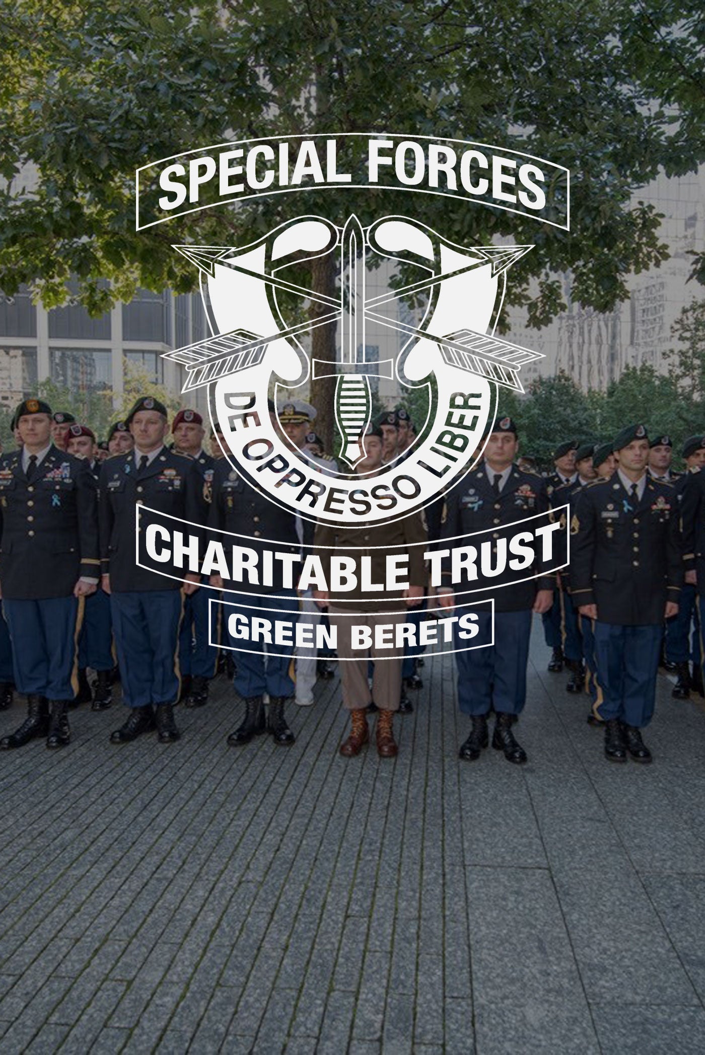 Members of the Special Forces Charitable Trust: Green Berets stand in an organized formation with their hands at their sides. The Special Forces Charitable Trust logo overlays on top of the image.
