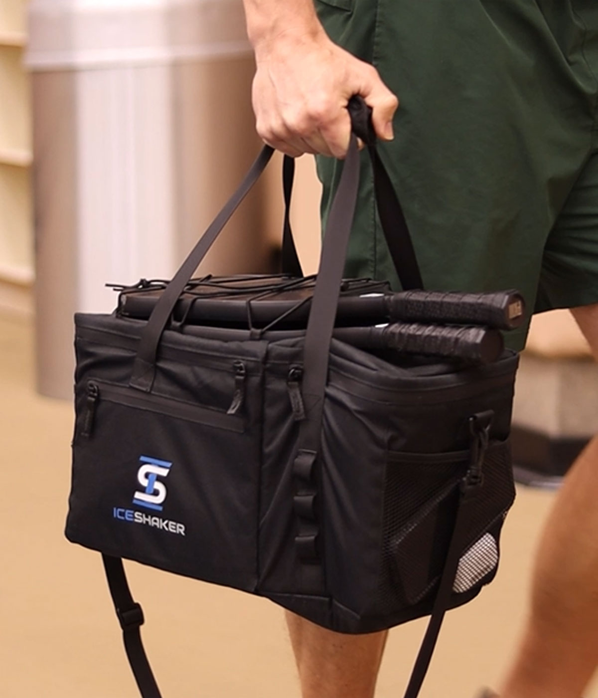 This image shows the Duffel Bag being held firmly by the durable carry handles.