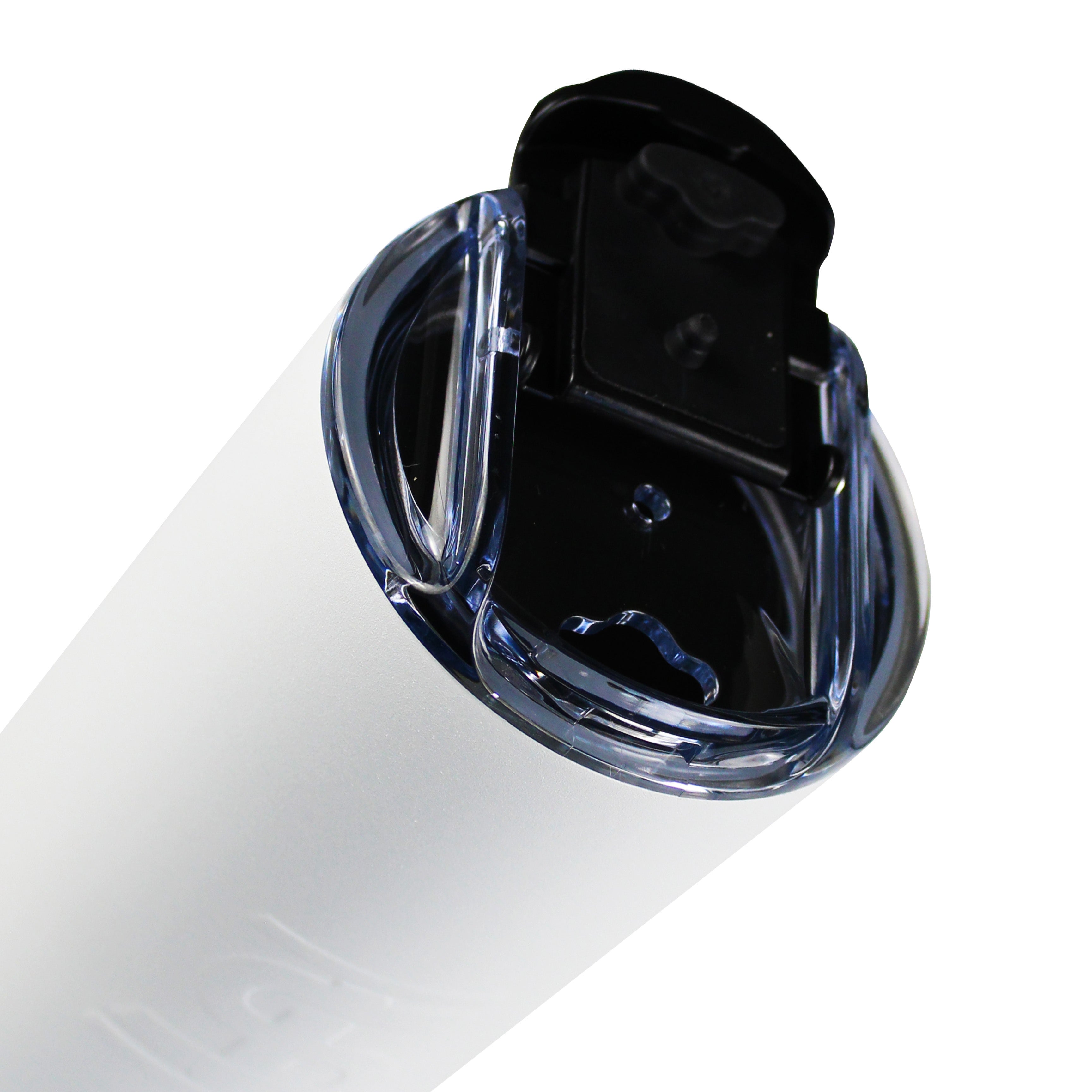 An image of the 20oz Skinny Tumbler tilted so that it shows a close-up view of the Twist-on, Leak-Proof Lid with the drink flap open.