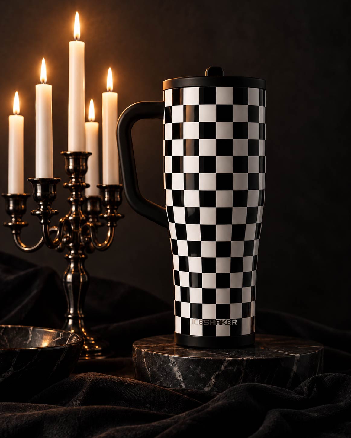 Black & White Checkers Legend Tumbler by candlelight