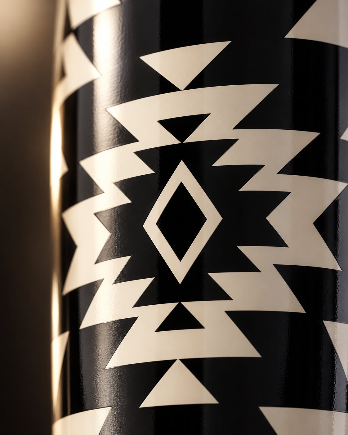 Close-up of the glossy black and cream geometric Ritual pattern